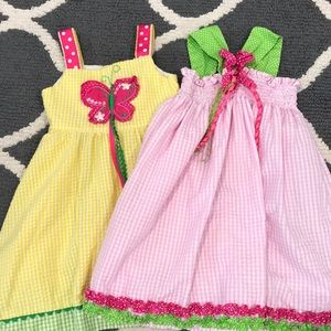 2T sleeveless dresses pink, green, yellow